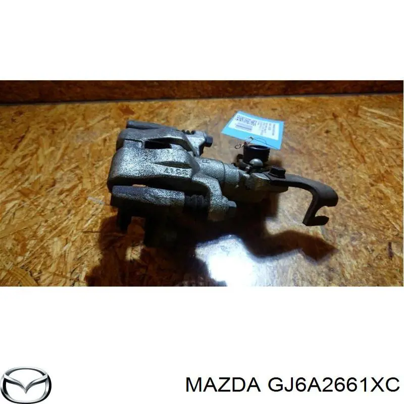Супорт гальмівний задній правий Mazda GJ6A2661XC ціна, від 37.33 USD