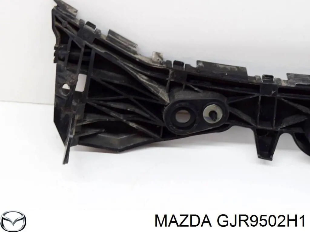 Купити GJR9502H1 Mazda Кронштейн бампера заднього, правий