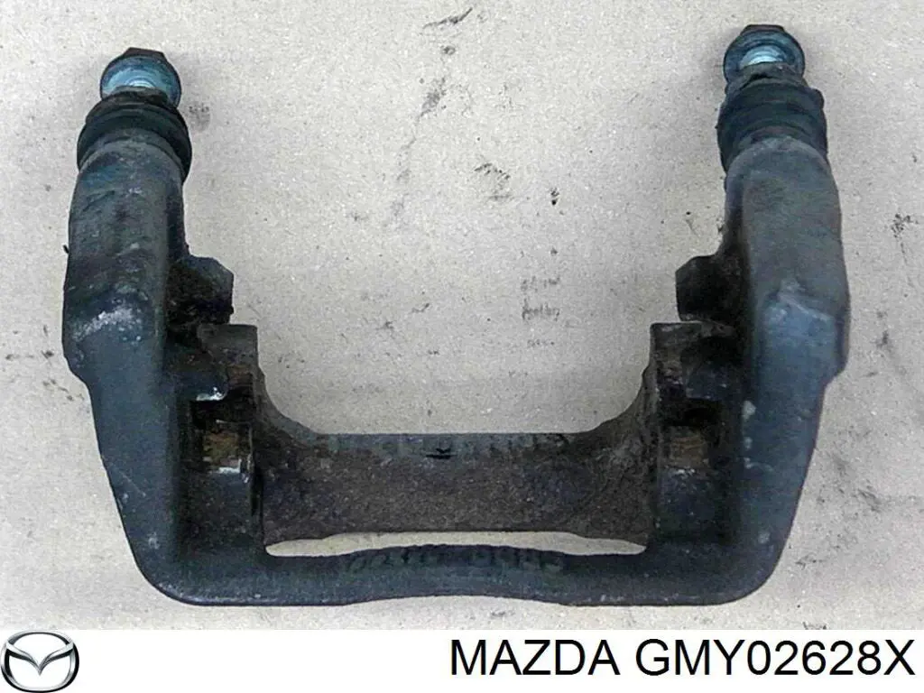 GMY02628X Mazda Скоба гальмівного заднього супорта