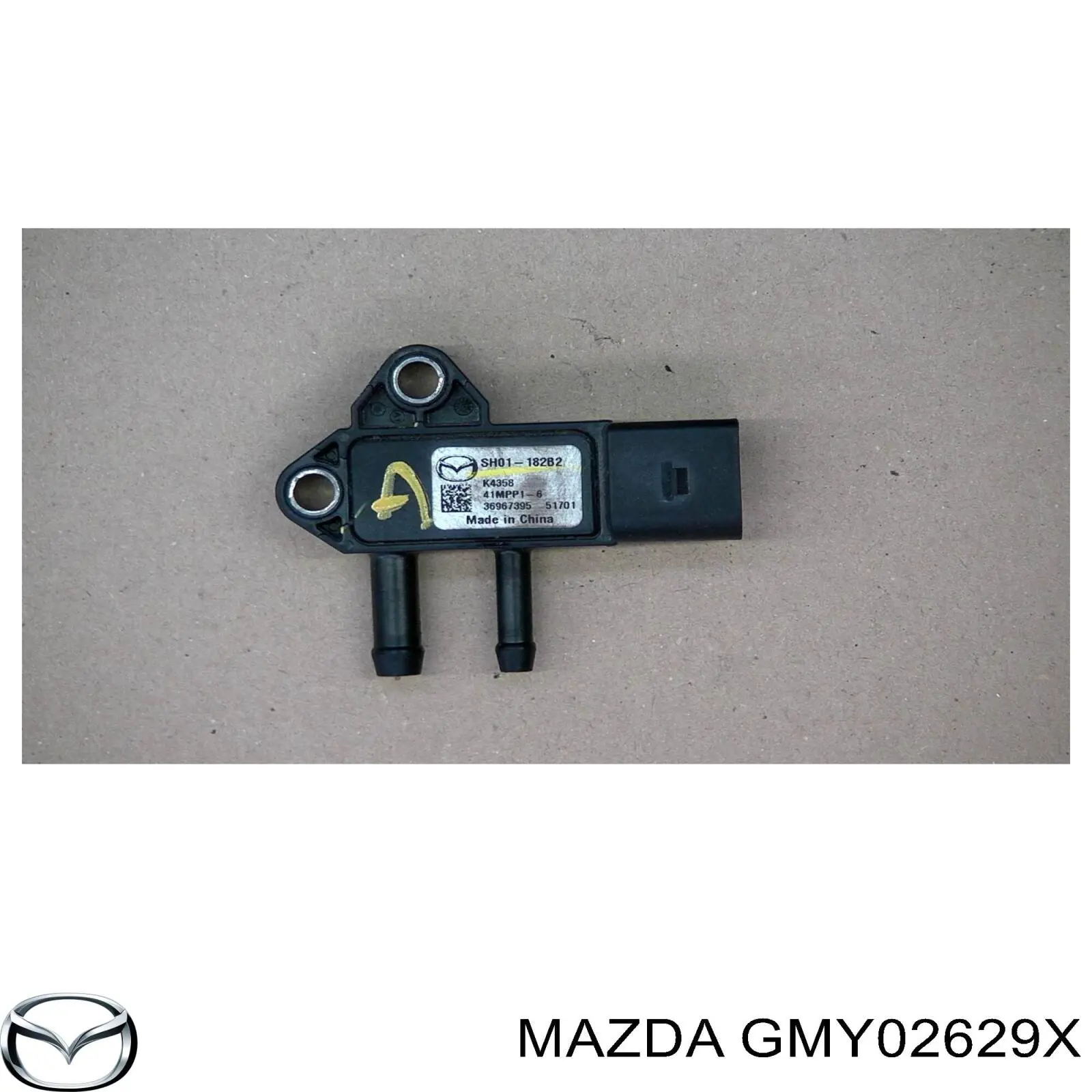 Скоба супорту заднього GMY02629X Mazda