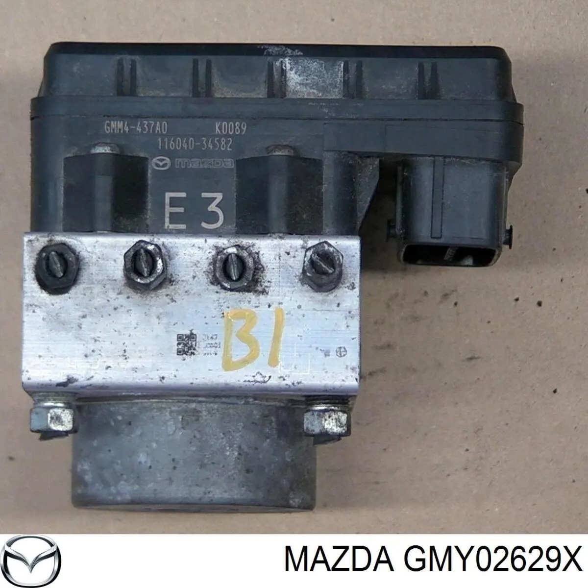 Скоба супорту заднього GMY02629X Mazda