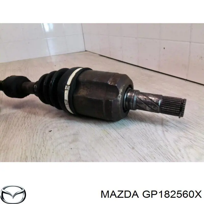 Ліва піввісь GP102560XA Mazda