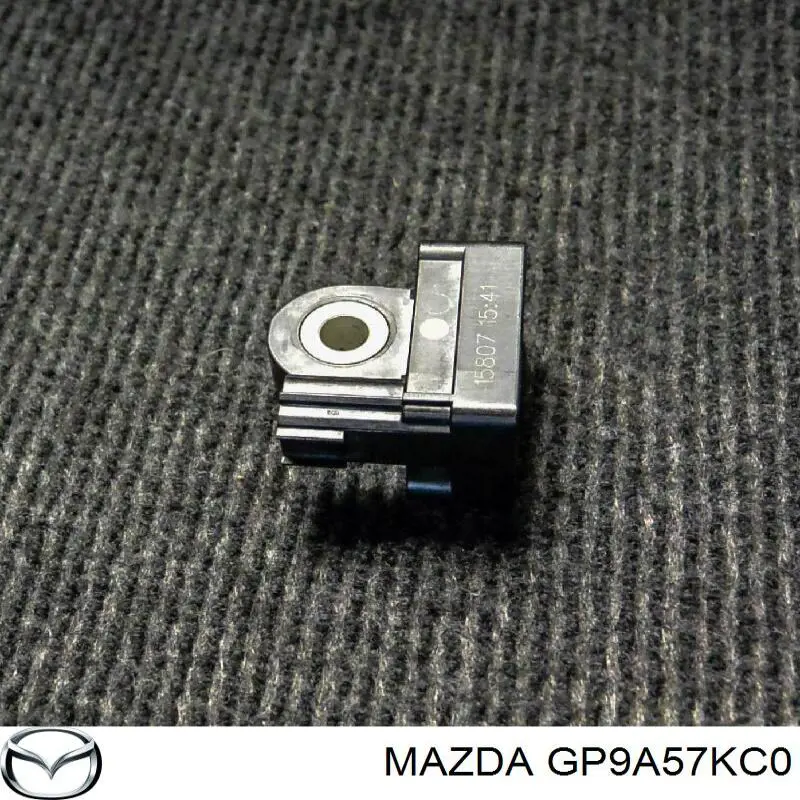Датчик подушки безпеки Mazda GP9A57KC0