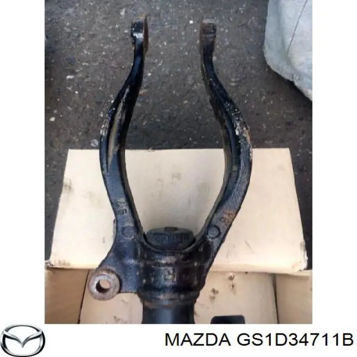 GS1D34711B Mazda Вилка нижня амортизатора переднього, права