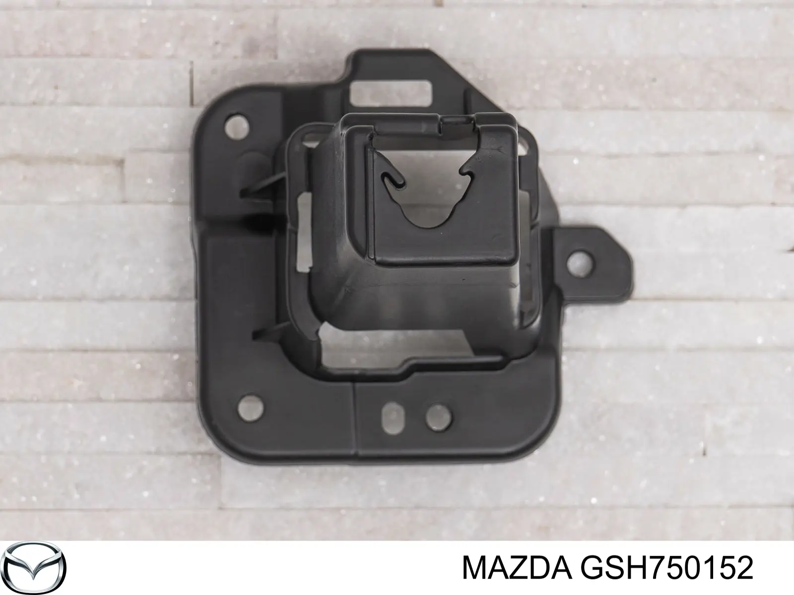Кронштейн решітки радіатора Mazda GSH750152 ціна, від 10.73 USD