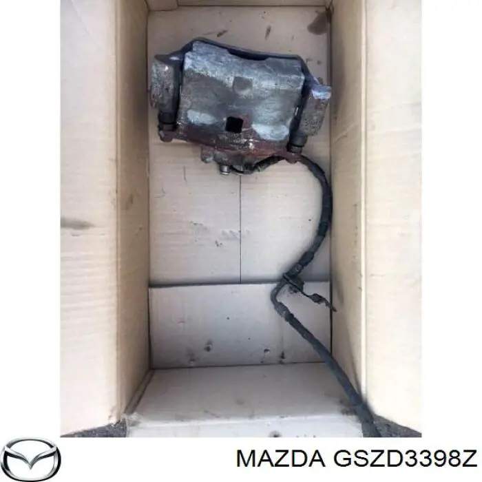 Купити GSZD3398Z Mazda Супорт гальмівний передній правий