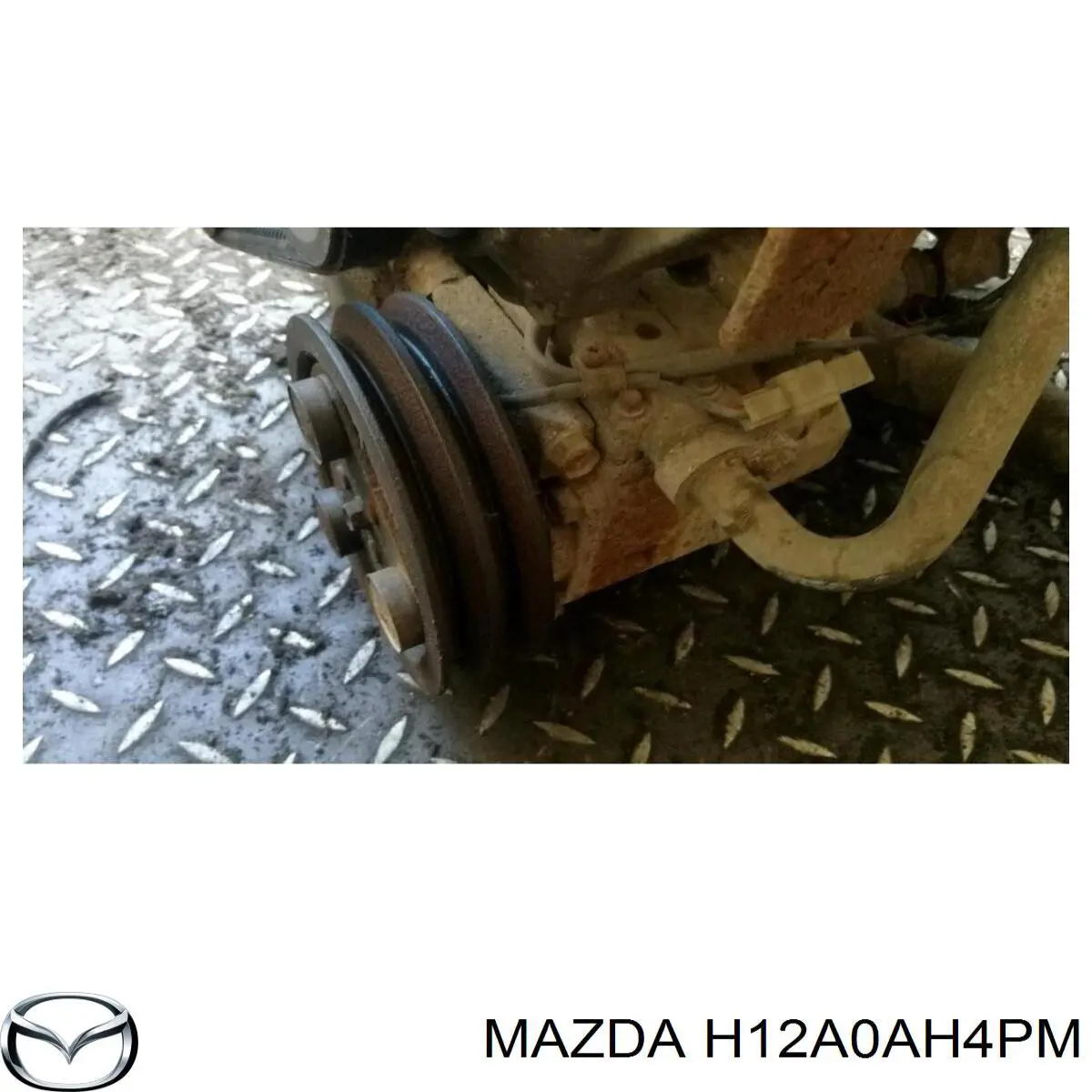 Компресор кондиціонера BJ3A61450B Mazda