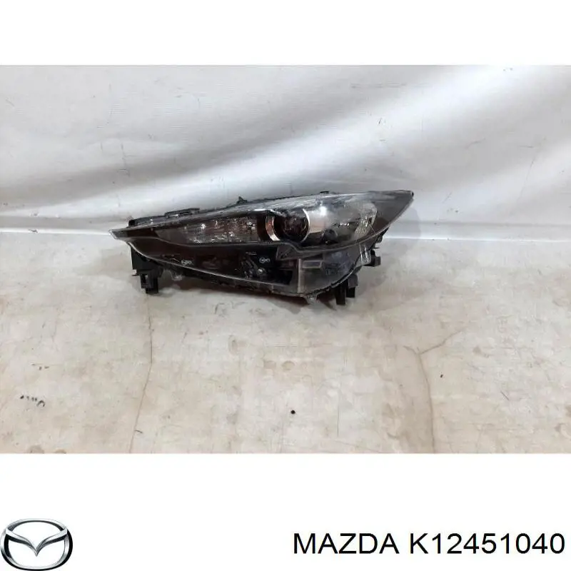 Фара ліва K12451040 Mazda