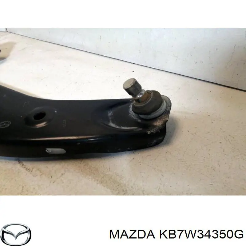 Купити KB7W34350F Mazda Лівий важіль передній нижній підвіски
