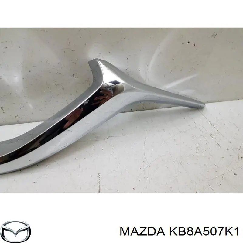 Молдинг решітки радіатора, лівий Mazda KB8A507K1 ціна, від 29.14 USD
