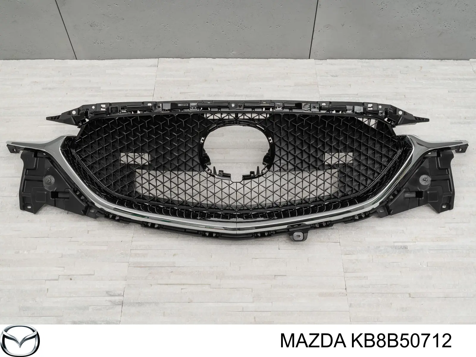 KB8B50712 Mazda Решітка радіатора