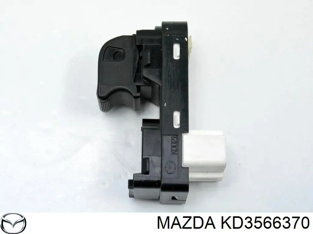 Кнопковий блок керування склопідіймачами передній правий Mazda KD3566370 ціна, від 3.26 USD