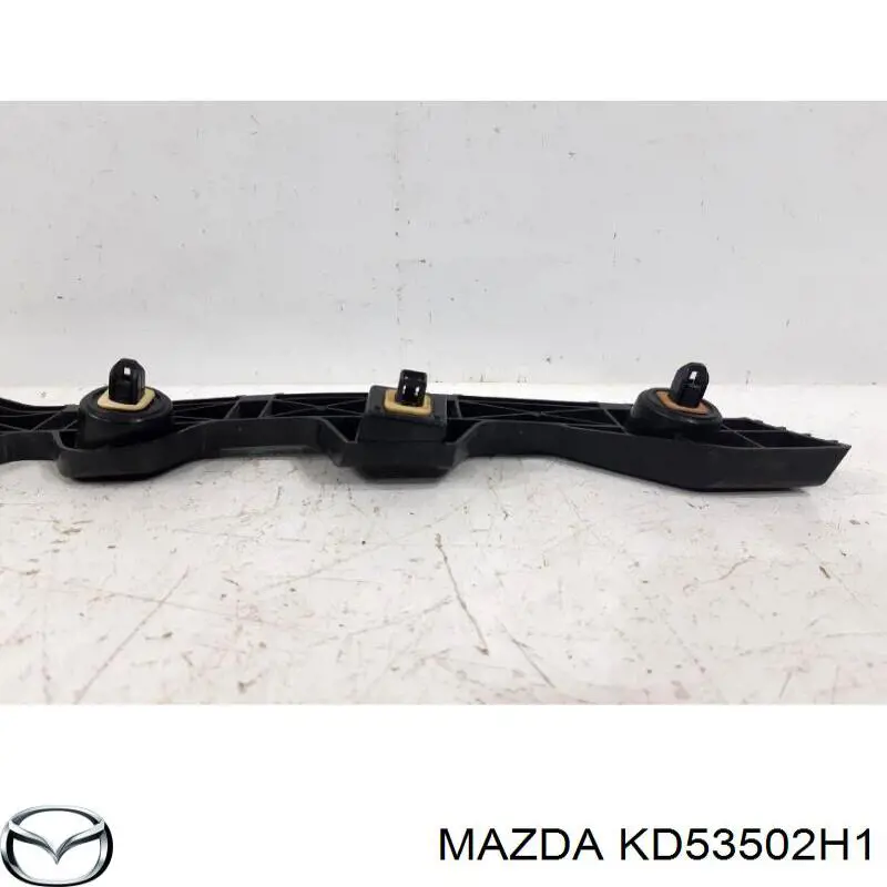 Кронштейн бампера заднього, зовнішній правий Mazda KD53502H1 ціна, від 6.30 USD