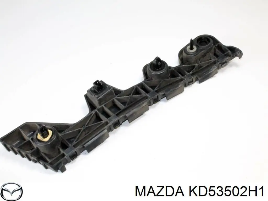 Кронштейн бампера заднього, зовнішній правий KD53502H1 Mazda