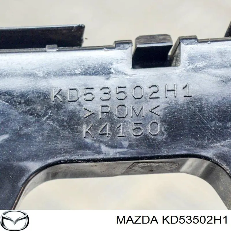 Кронштейн бампера заднього, зовнішній правий Mazda KD53502H1