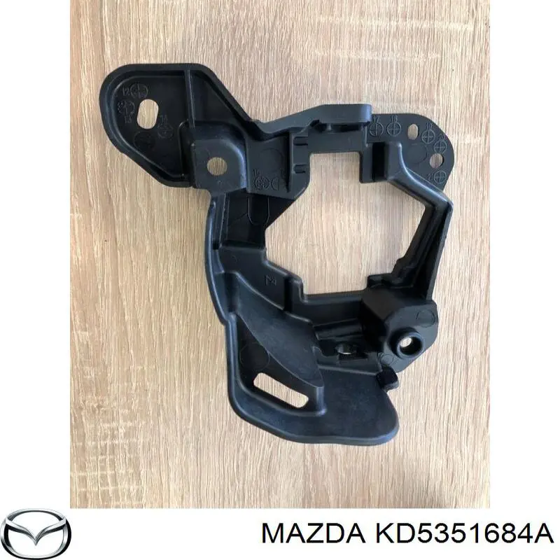 Кронштейн кріплення протитуманною фари, правої Mazda KD5351684A ціна, від 3.84 USD