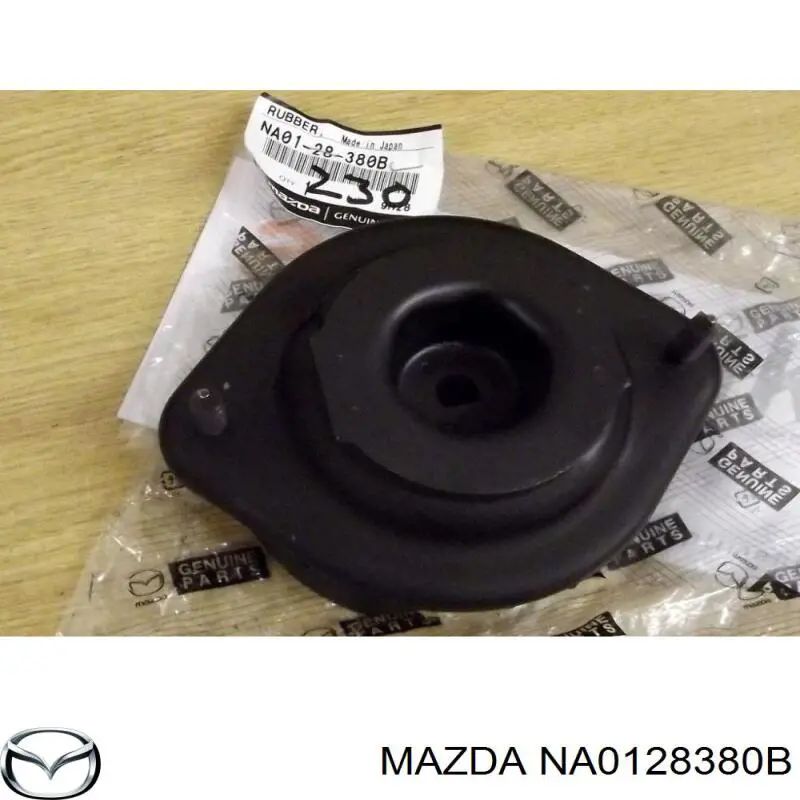 Купити NA0128380B Mazda Опора амортизатора переднього