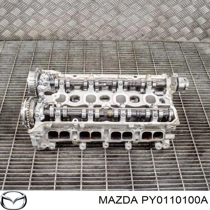 PY0110100A Mazda Головка циліндрів