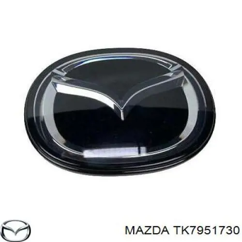 Емблема капота TK7951730 Mazda