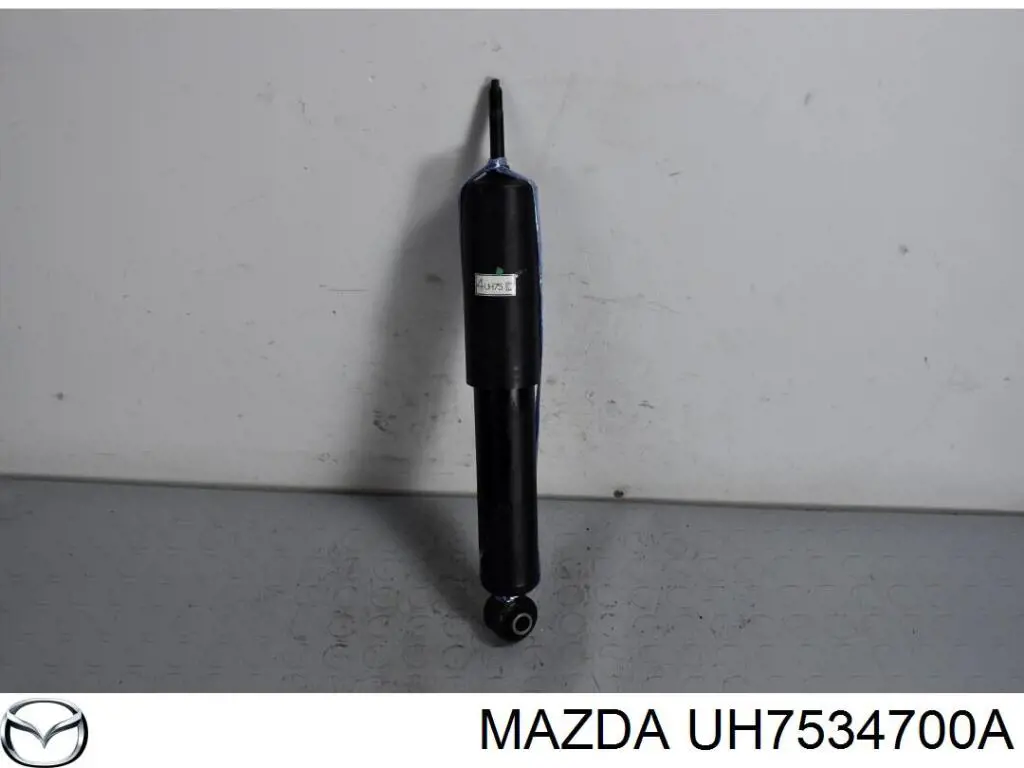 Стойка амортизатора передняя Mazda UH7534700A ціна, від 28.03 USD