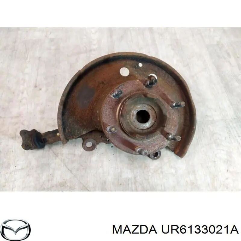 UR6133021A Mazda Цапфа - поворотний кулак передній, правий