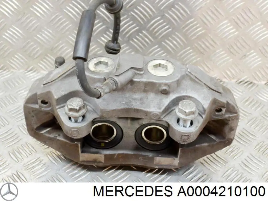 Супорт гальмівний передній правий A0004210100 Mercedes