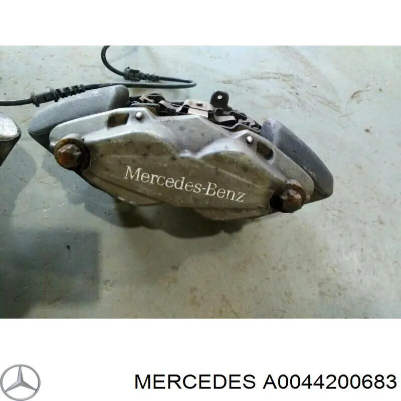 Купити A0044201883 Mercedes Супорт гальмівний передній правий