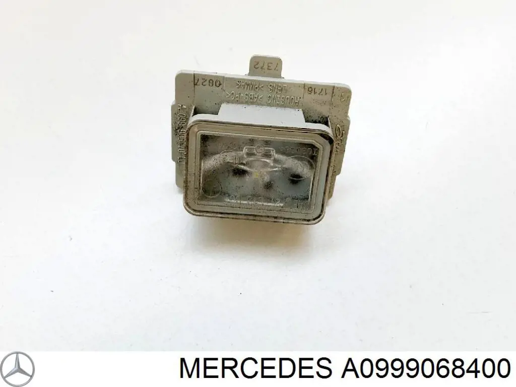 Ліхтар підсвічування заднього номерного знака A0999068400 Mercedes