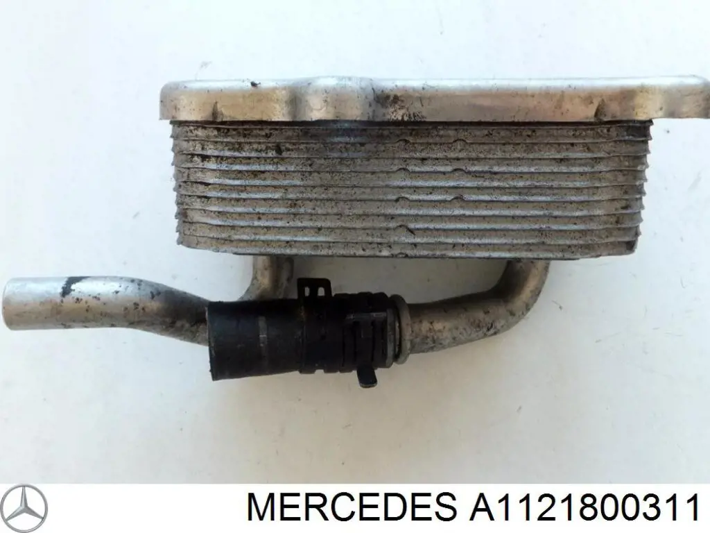 Радіатор масляний A1121800311 Mercedes