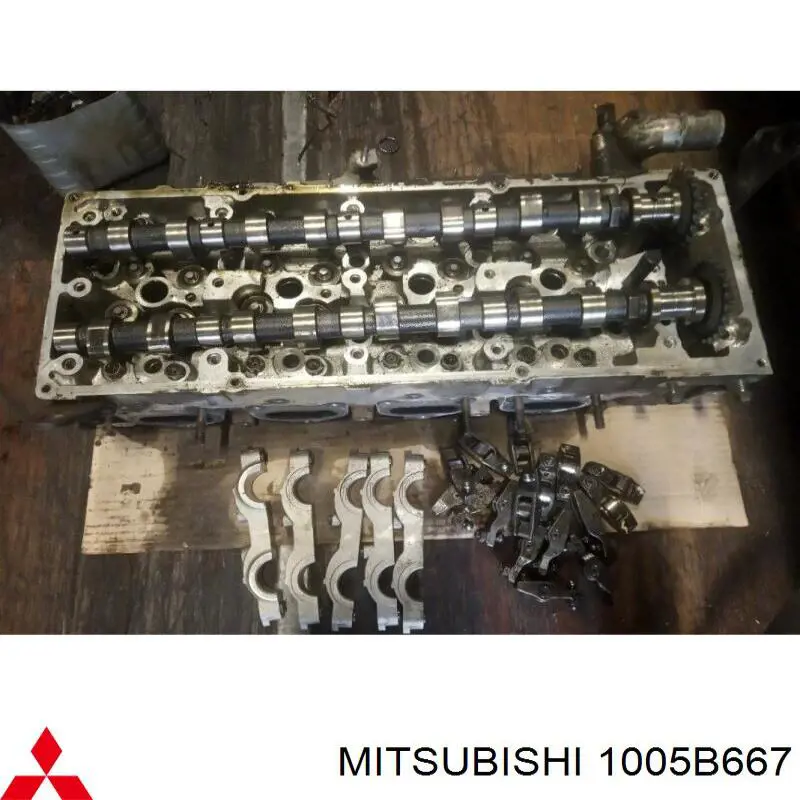 Купити 1005B667 Mitsubishi Головка блоку