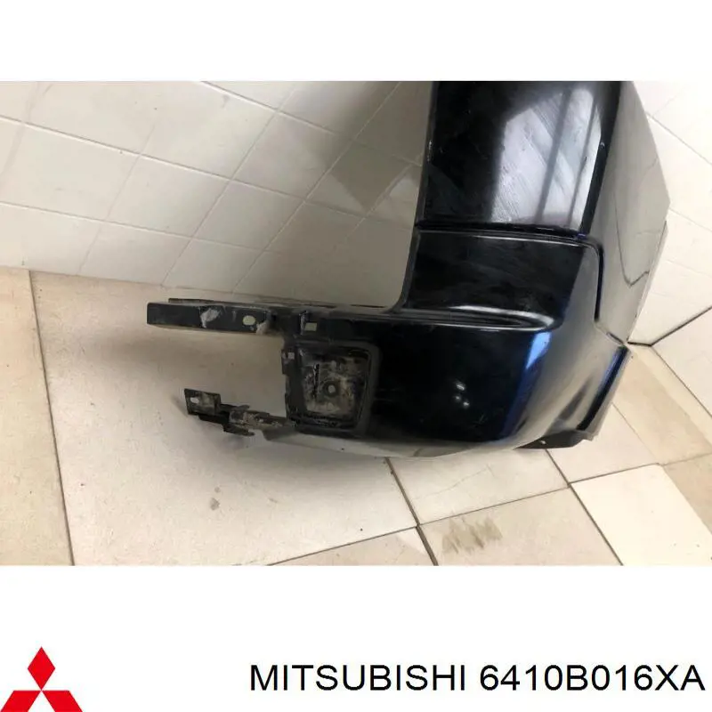 Купити 6410B016XA Mitsubishi Бампер задній, права частина