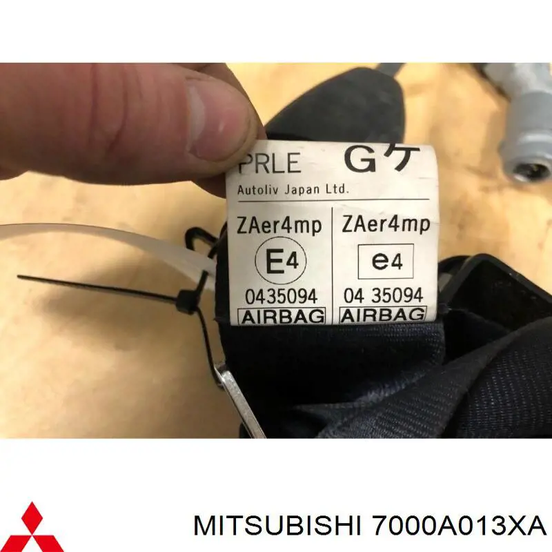 Ремінь безпеки передній лівий Mitsubishi 7000A013XA