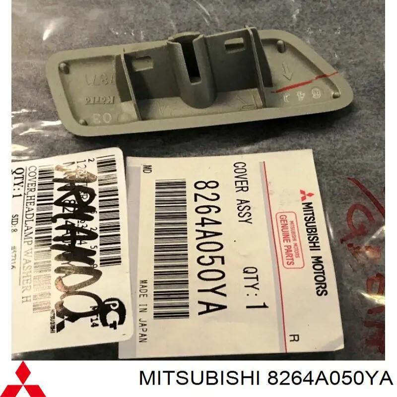 Накладка форсунки омивача фари передньої 8264A050YA Mitsubishi