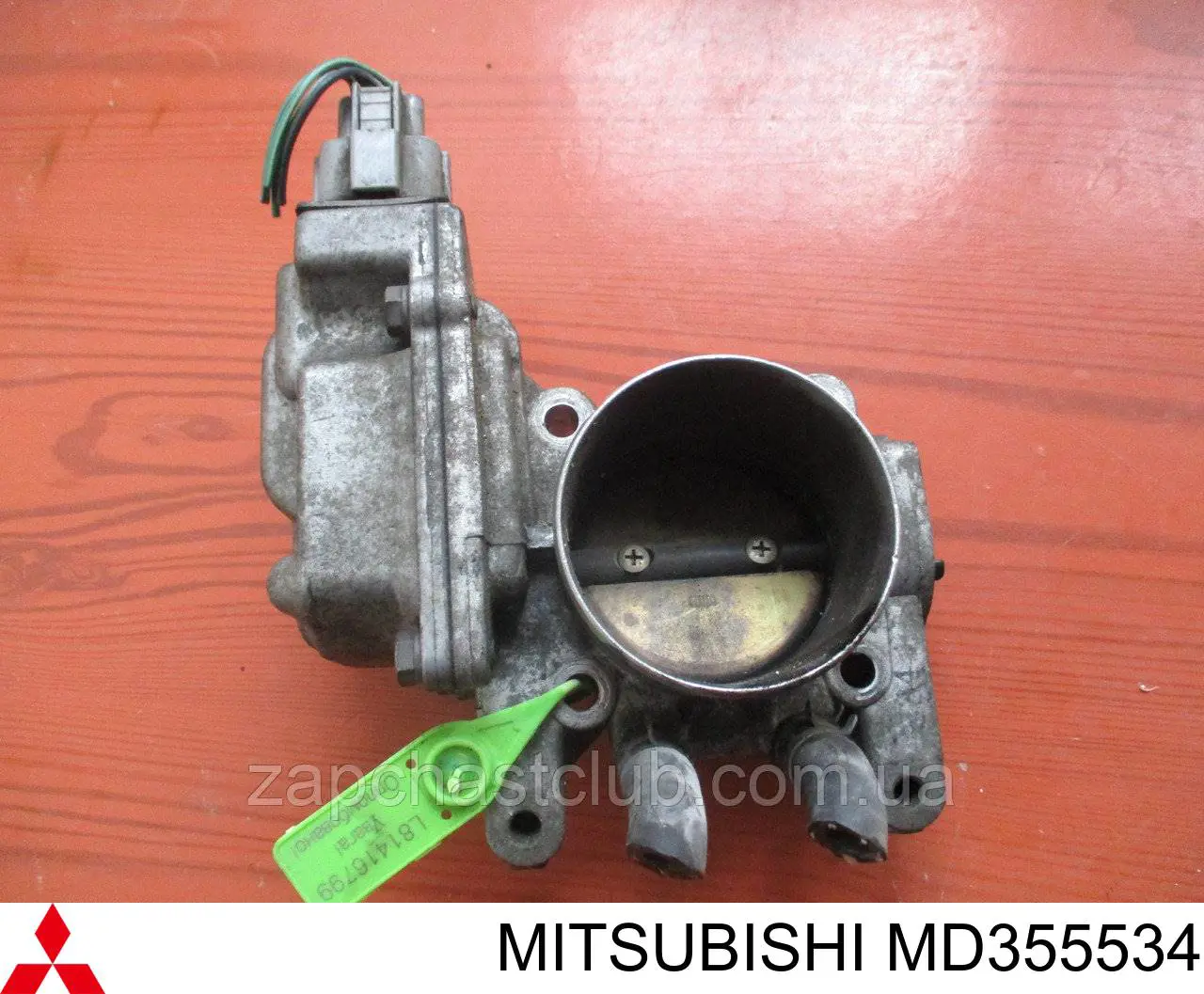 Дросільна заслінка в зборі MD355534 Mitsubishi