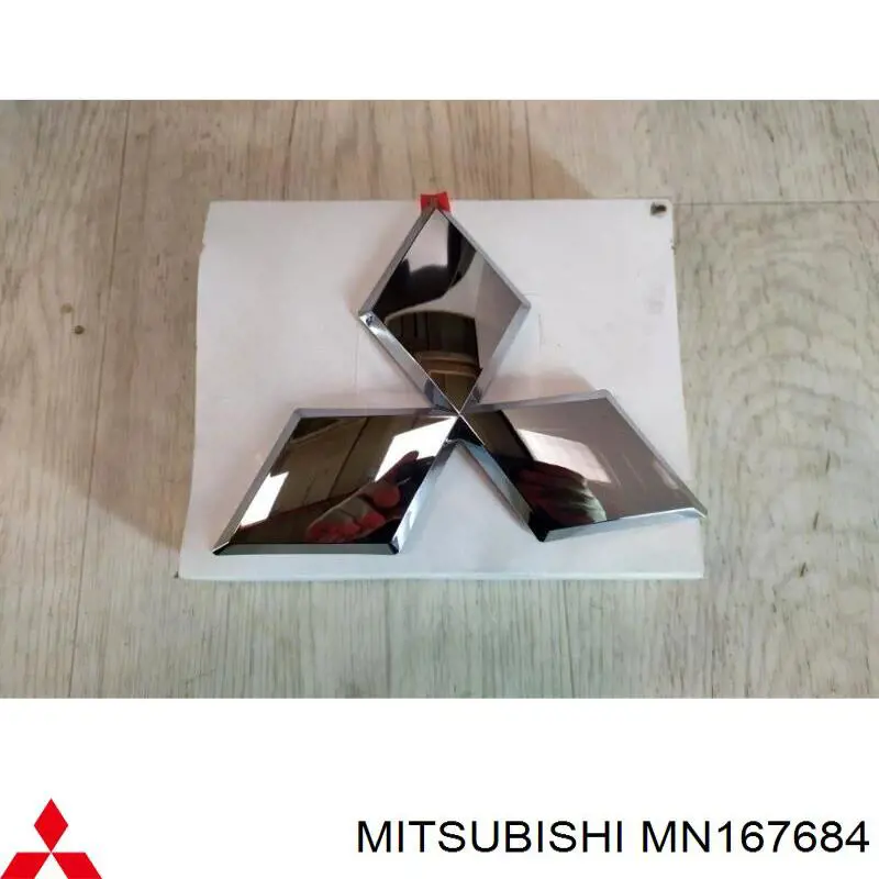 Емблема решітки радіатора Mitsubishi Pajero SPORT (KH) (Міцубісі Паджеро)