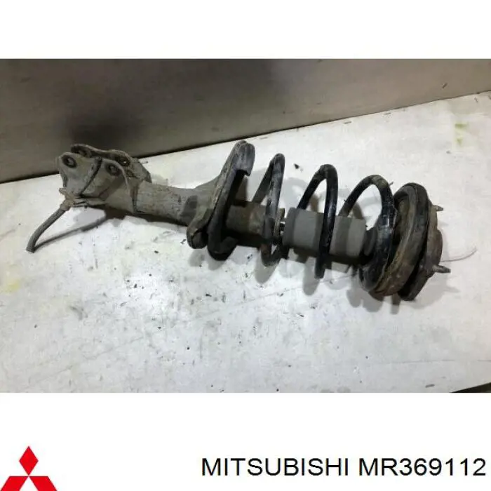 MR369112 Mitsubishi амортизатор передній, лівий