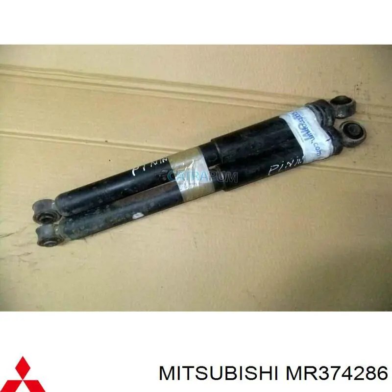 Купити MR374286 Mitsubishi Стійка амортизатора задня