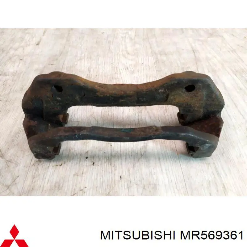 Купити MR569361 Mitsubishi Скоба супорту переднього