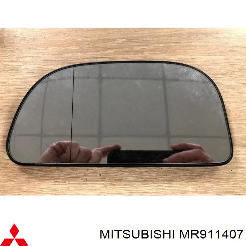 Купити MR911407 Mitsubishi Дзеркальний елемент дзеркала заднього виду, лівого