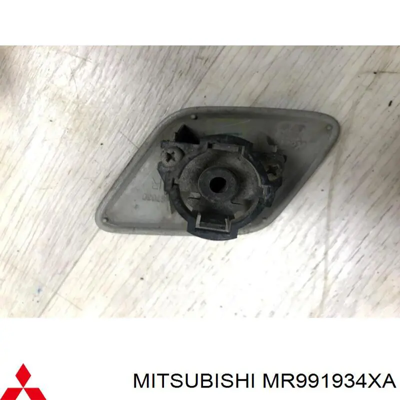 Накладка форсунки омивача фари передньої MR991934XA Mitsubishi