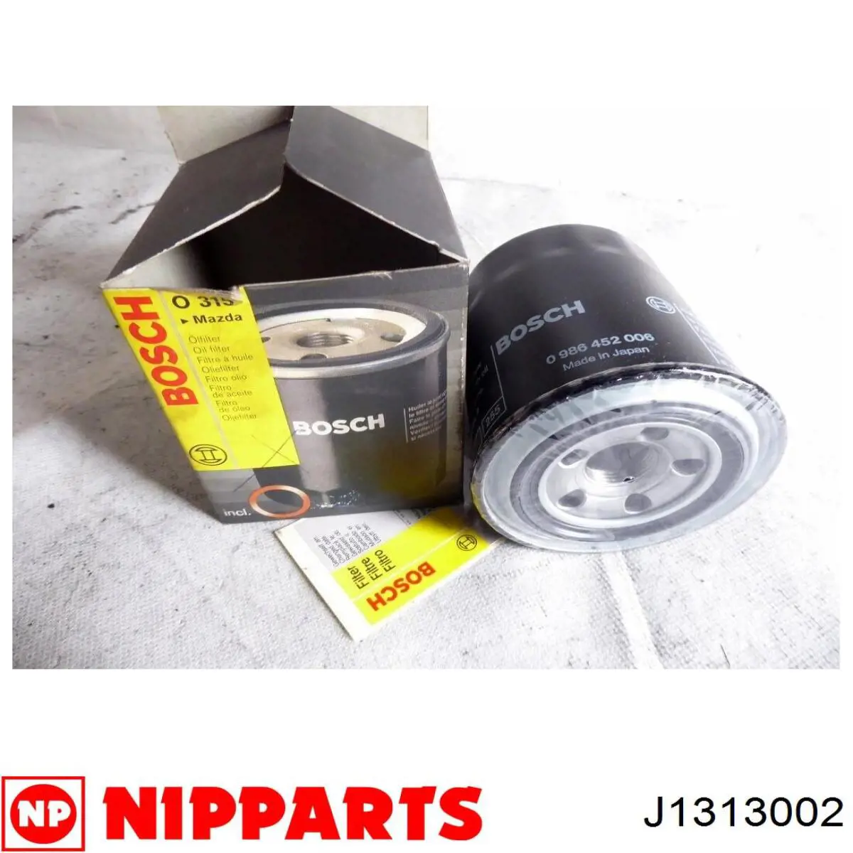 Масляний фільтр двигуна Nipparts J1313002 ціна, від 6.33 USD