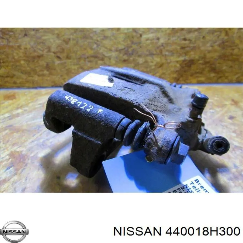 440018H300 Nissan супорт гальмівний задній правий