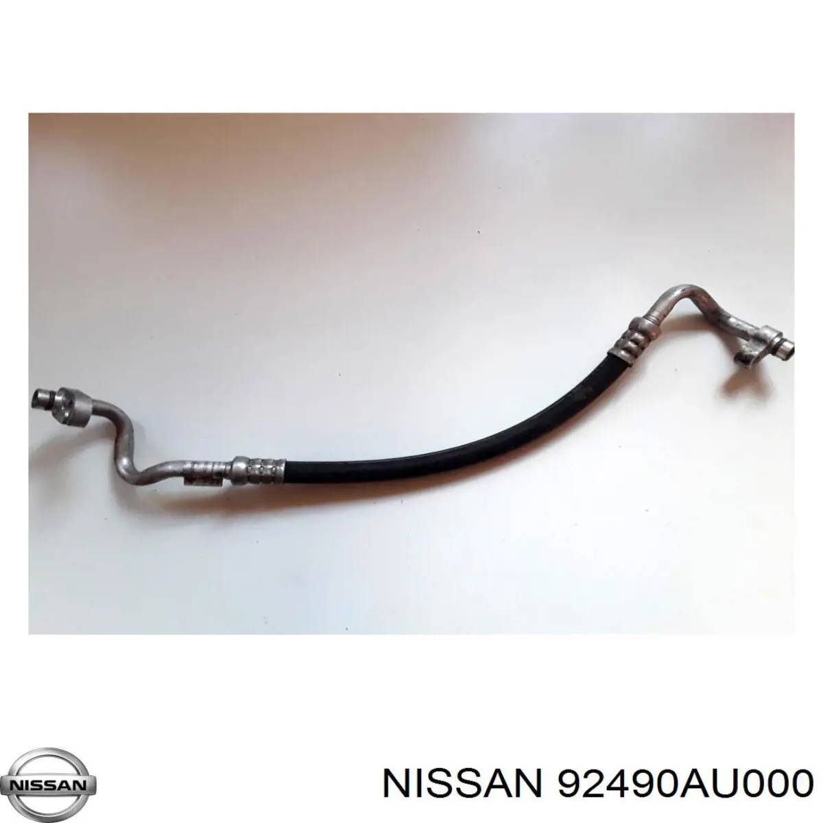 Купити 92490AU000 Nissan/Infiniti Шланг кондиціонера, від компресора до радіатора
