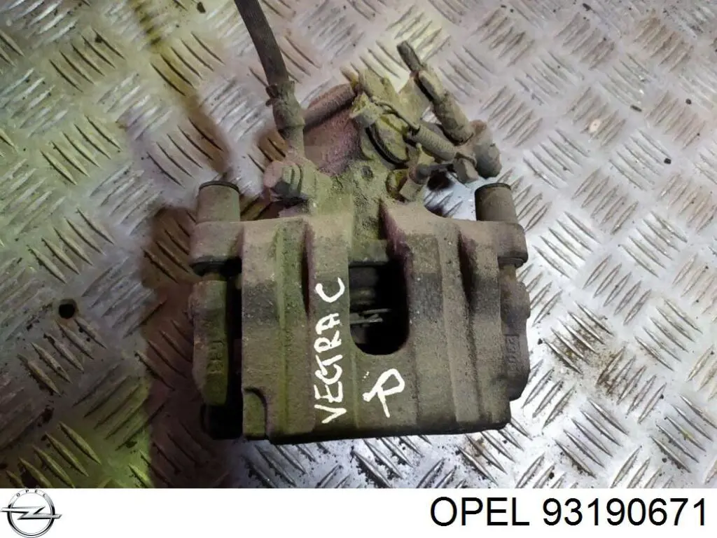 Супорт задній правий 93190671 Opel