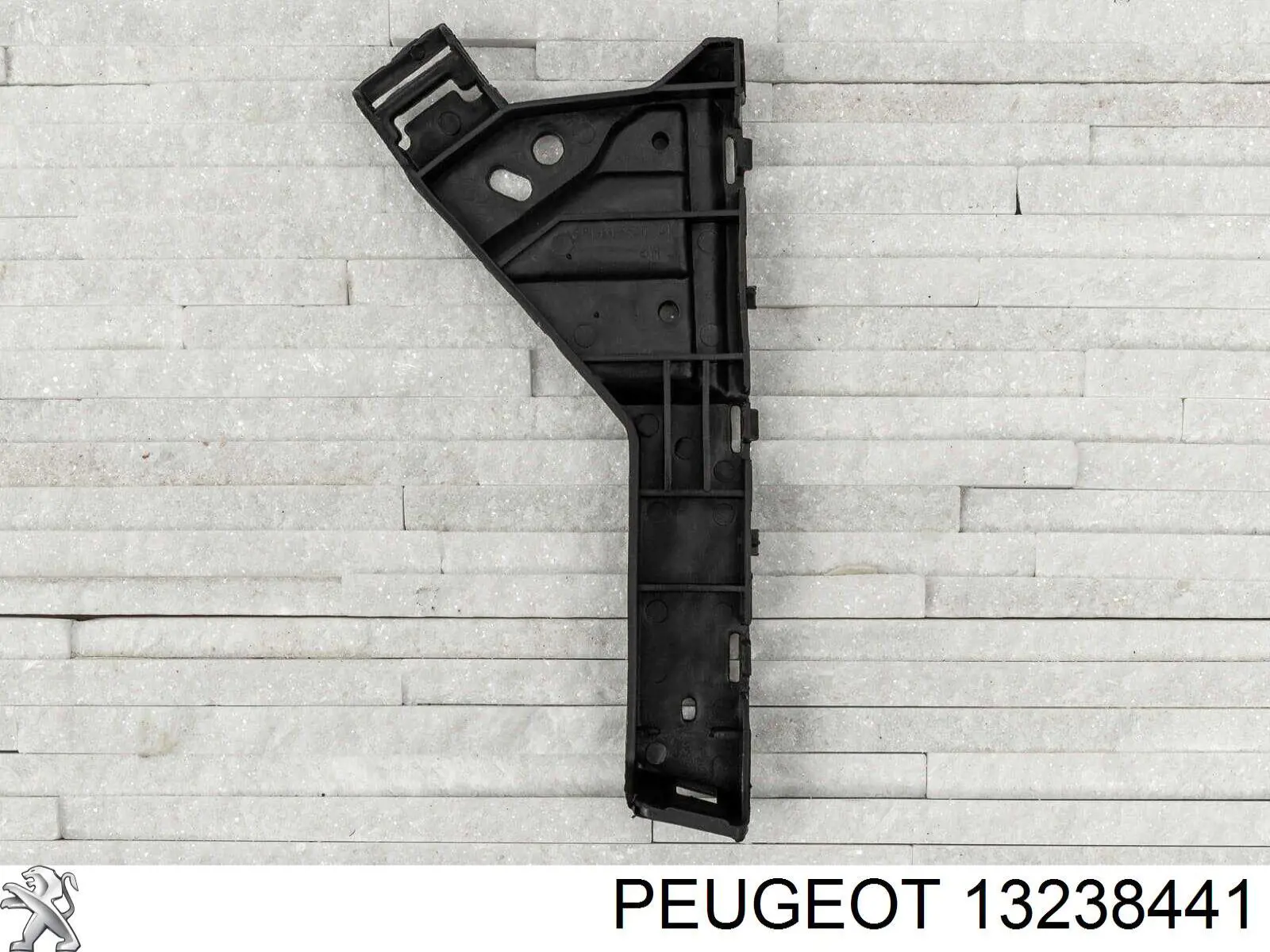 Кронштейн бампера переднього, лівий 13238441 Peugeot/Citroen