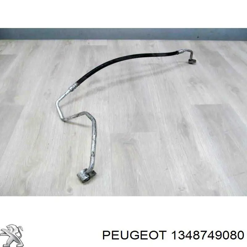 Купити 1348749080 Peugeot/Citroen Шланг кондиціонера, від компресора до радіатора
