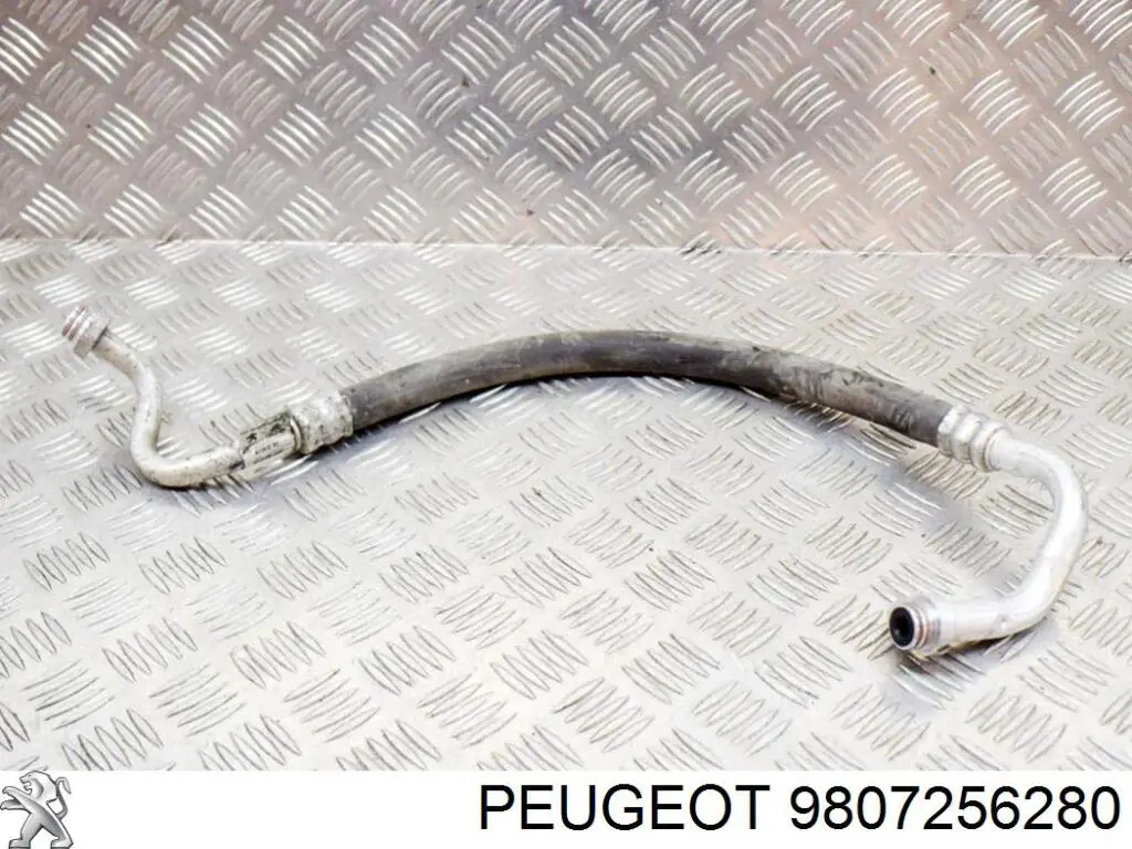 Шланг кондиціонера, від компресора до радіатора 9807256280 Peugeot/Citroen