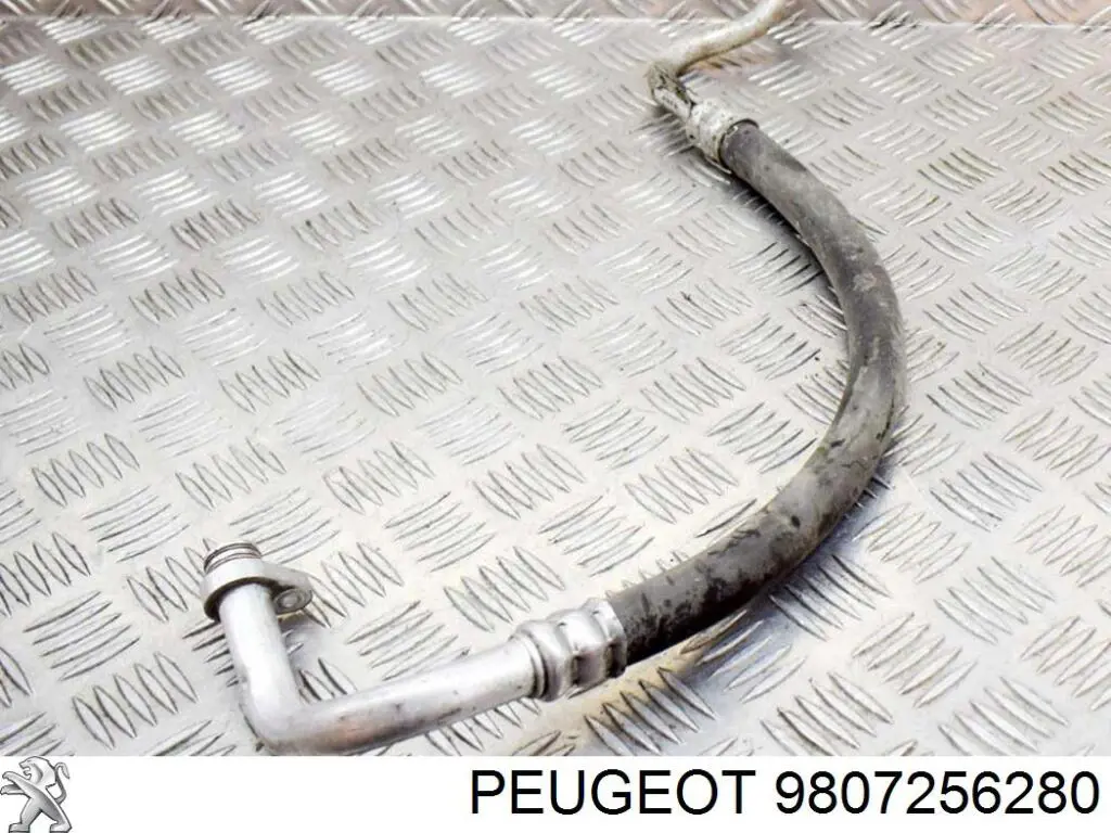 Шланг кондиціонера, від компресора до радіатора 9807256280 Peugeot/Citroen