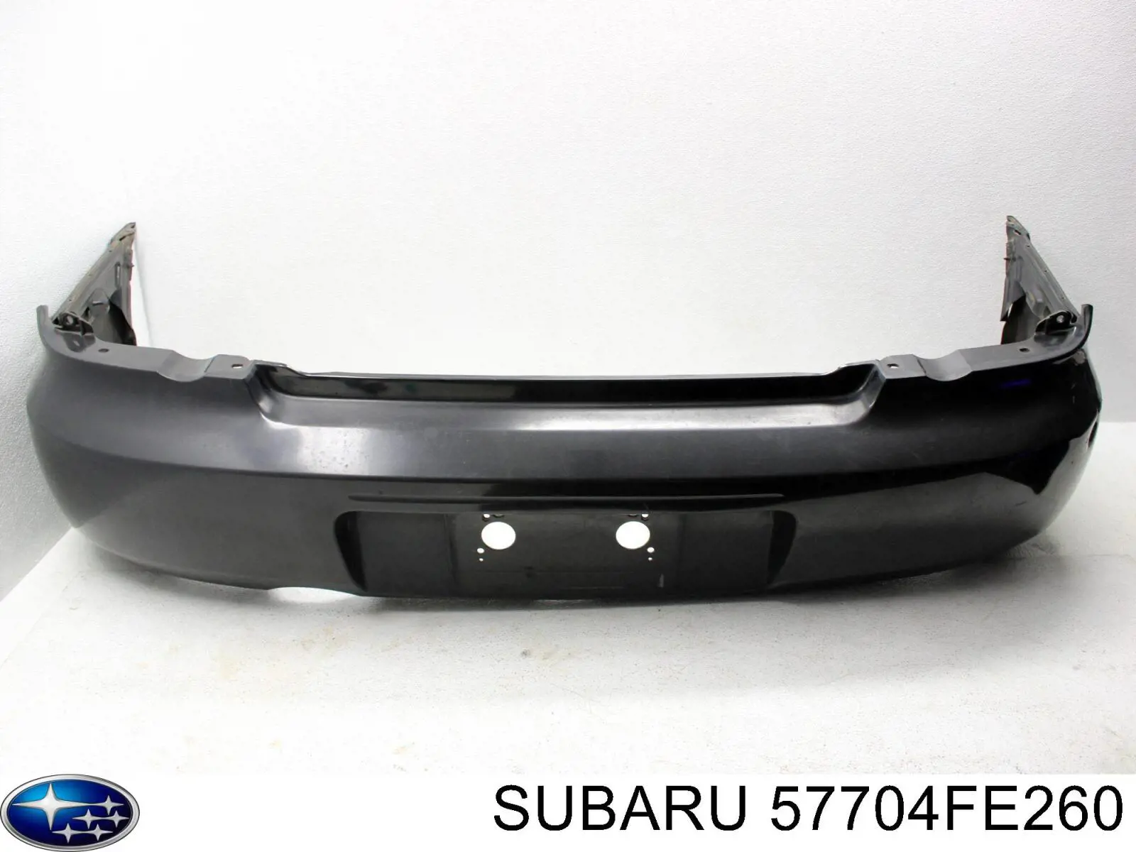 Бампер задній Subaru 57704FE260