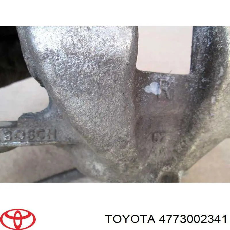 Купити 4773002341 Toyota Супорт гальмівний передній правий